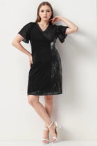 Plus‑Size Midi - Jurk Met Taillebroche — Zwart