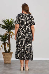 Plus - Size Patterned Dress With Ruffled Hem — Multicolor